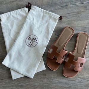 Hermes Oran gold piqûres écrues